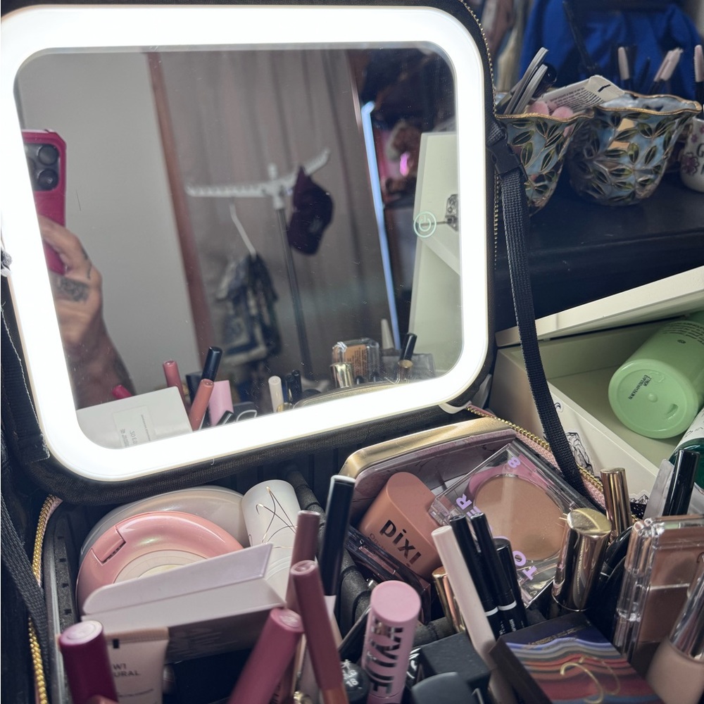 Make up case with different light settings. makeup not included
